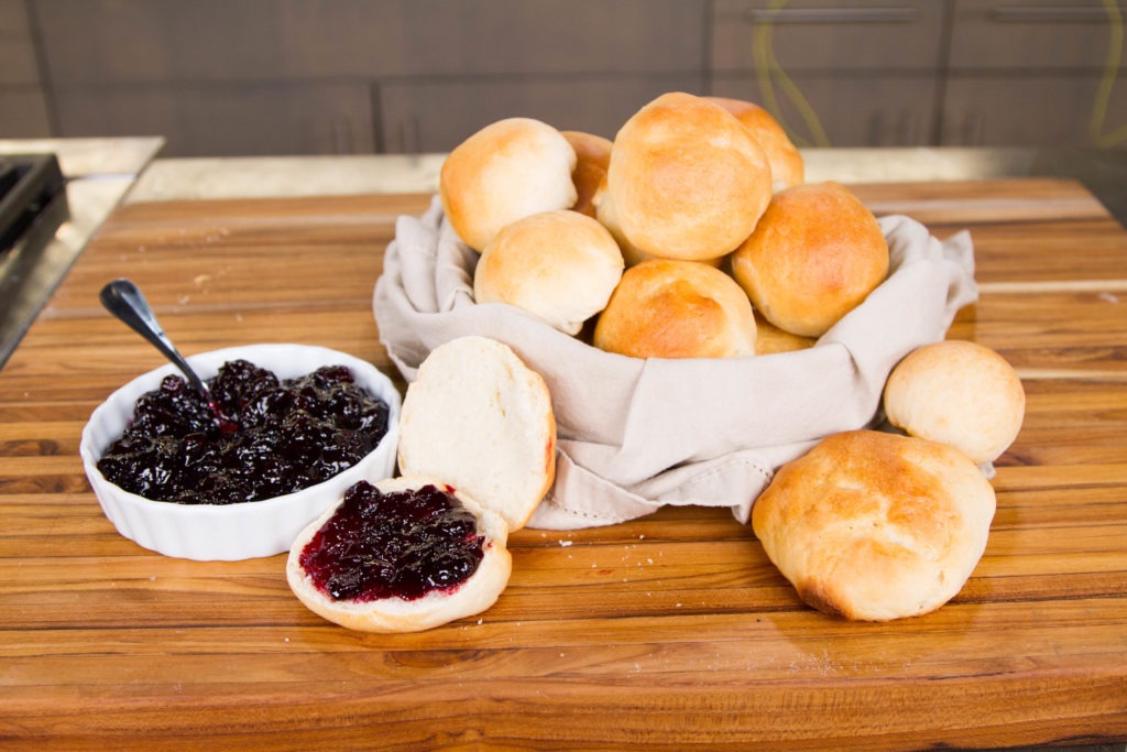 Blueberry jam with warm fresh rolls