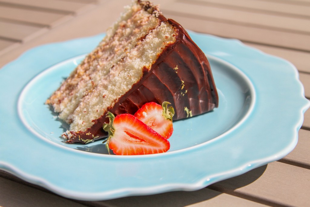 Slice of chocolate covered strawberry cake