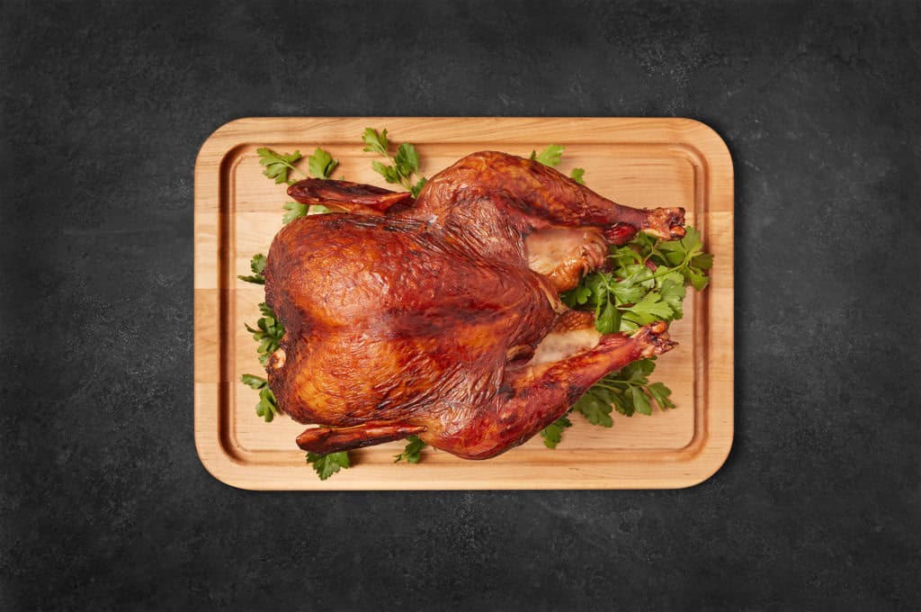 Roast turkey on cutting board