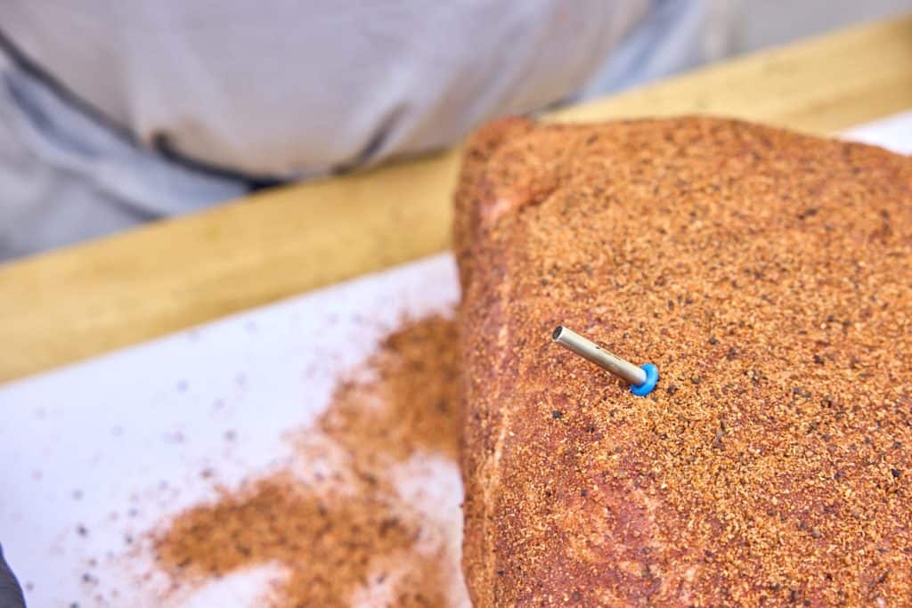 RFX MEAT probe in a raw seasoned pork butt