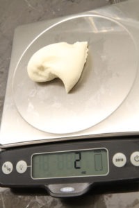 Weigh the rolls into 2-oz balls