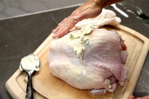 Spread Herb butter to the outside of the Turkey Breast