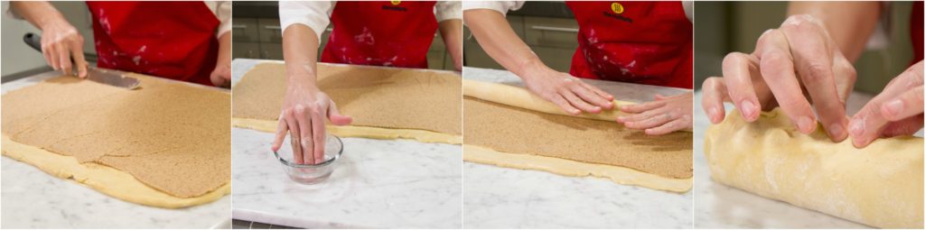 Filling rolled out dough and rolling into a log for cinnamon rolls.