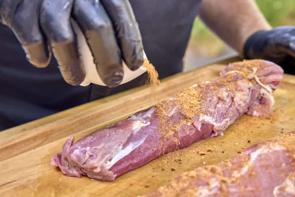 Seasoning the pork tenderloin