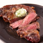 GRILLED RIB EYE STEAK WITH COMPOUND BUTTER