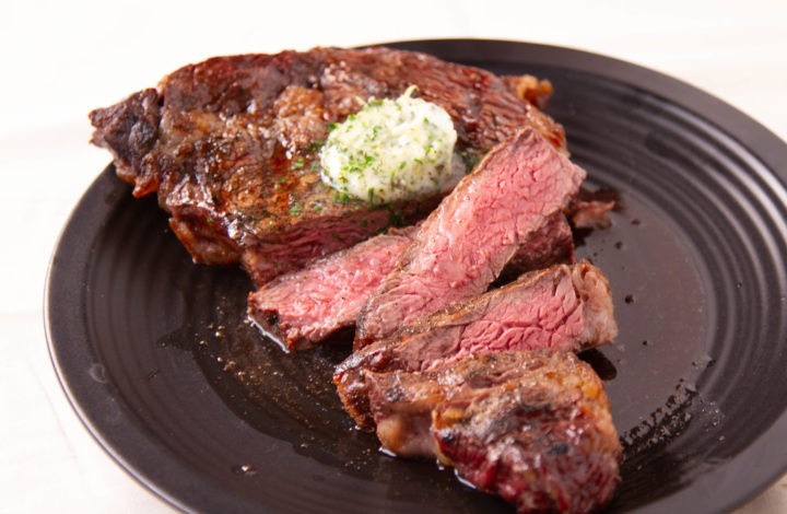 GRILLED RIB EYE STEAK WITH COMPOUND BUTTER