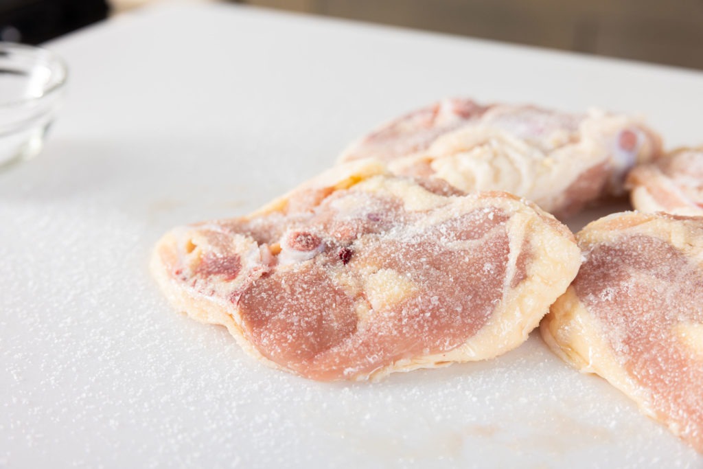 Salting the chicken for dry-brining