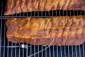 ribs with probe in smoker