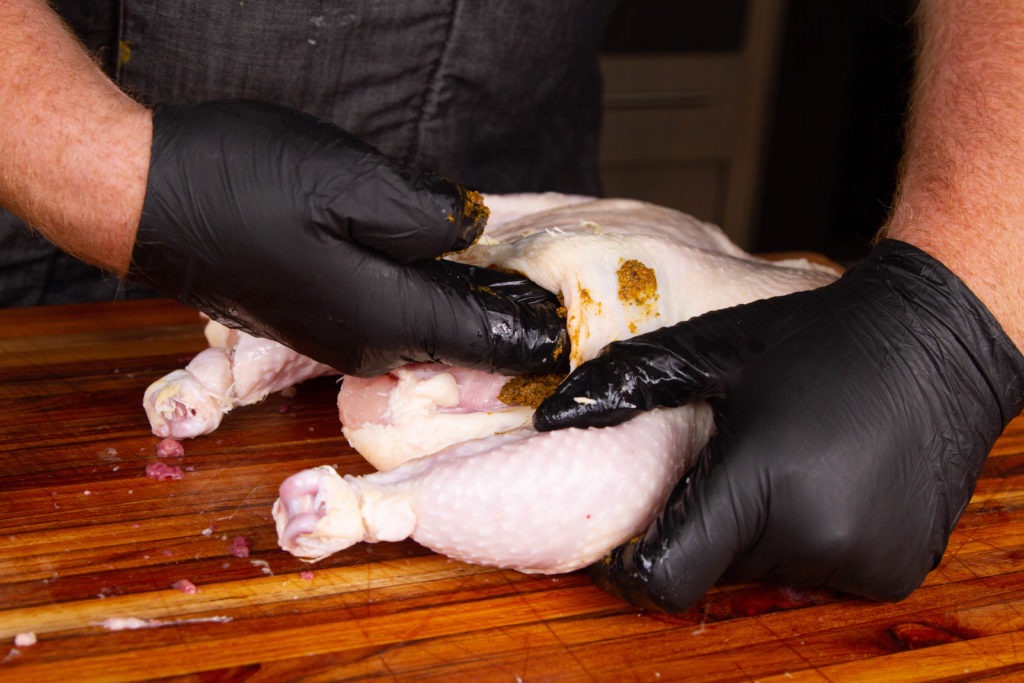 Stuff compound butter under the chicken skin for flavor and crispiness