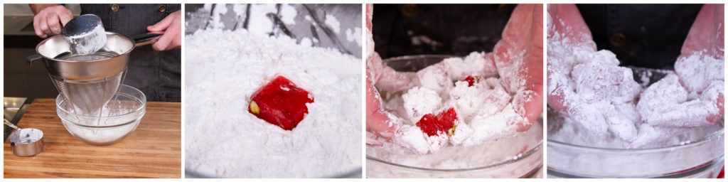 Dredge the Turkish delight pieces in powdered sugar