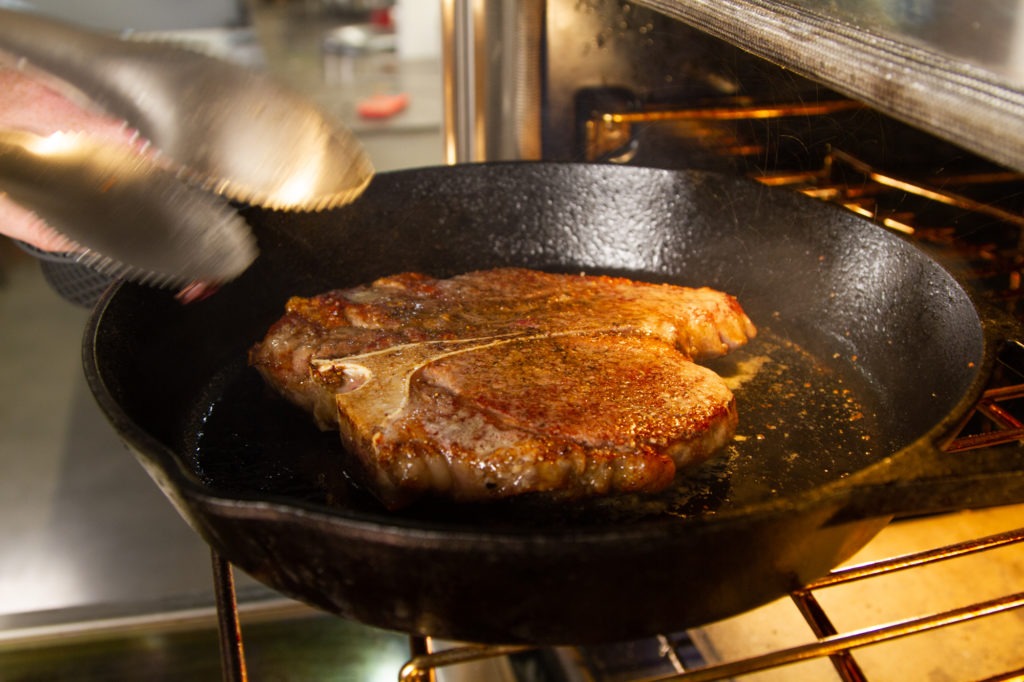 A light golden brown sear is all you need on the first side of the steak. 