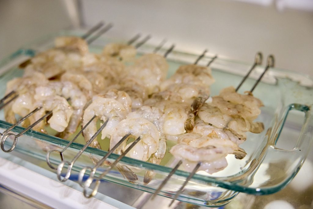 Shrimp on a pan, set for drying out in the fridge