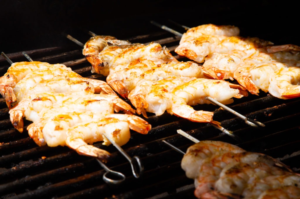 Grill the shrimp for 2 minutes, then flip