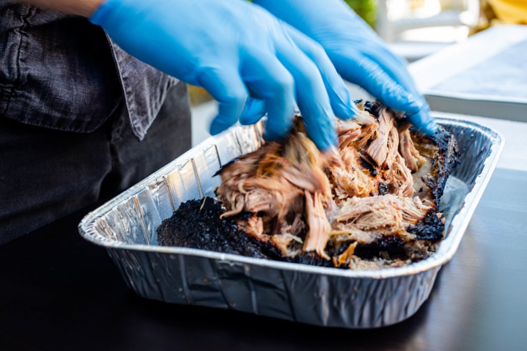 Pulled pork BBQ is made easier with a BBQ control fan.