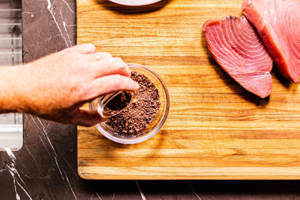 Tuna steaks being prepared to sear