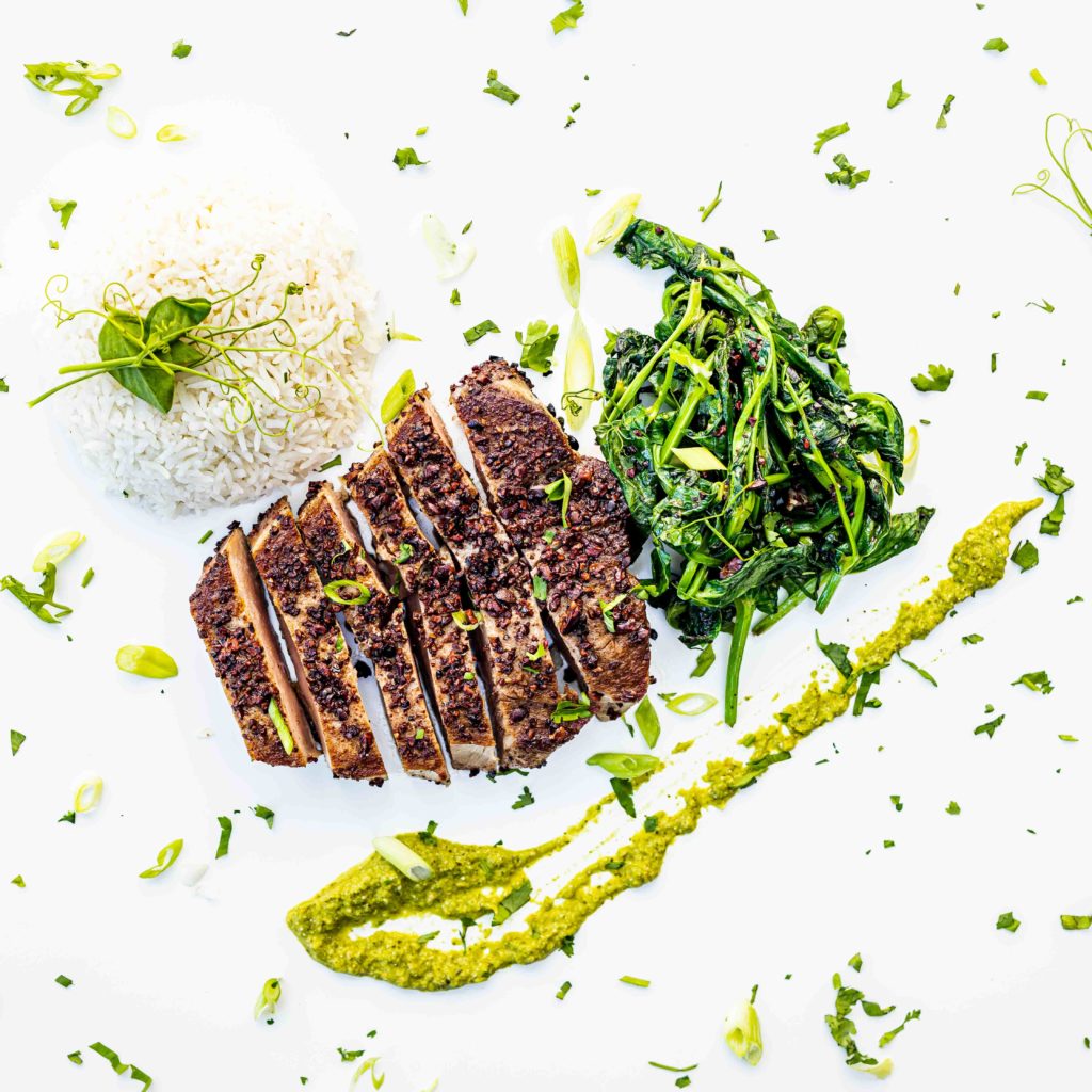 Seared tuna steak, mole verde, greens, rice
