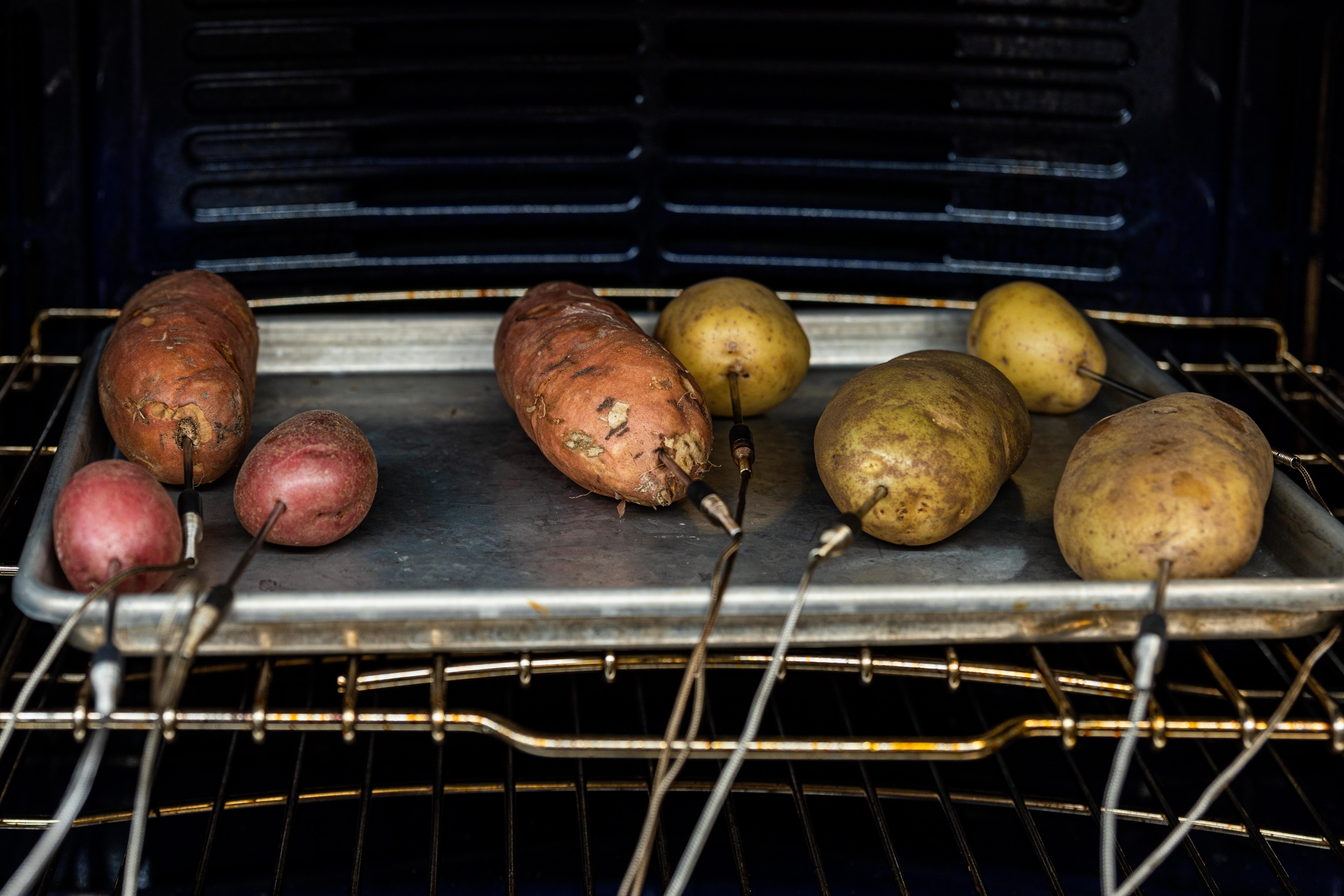 Probed potatoes baking in the oven