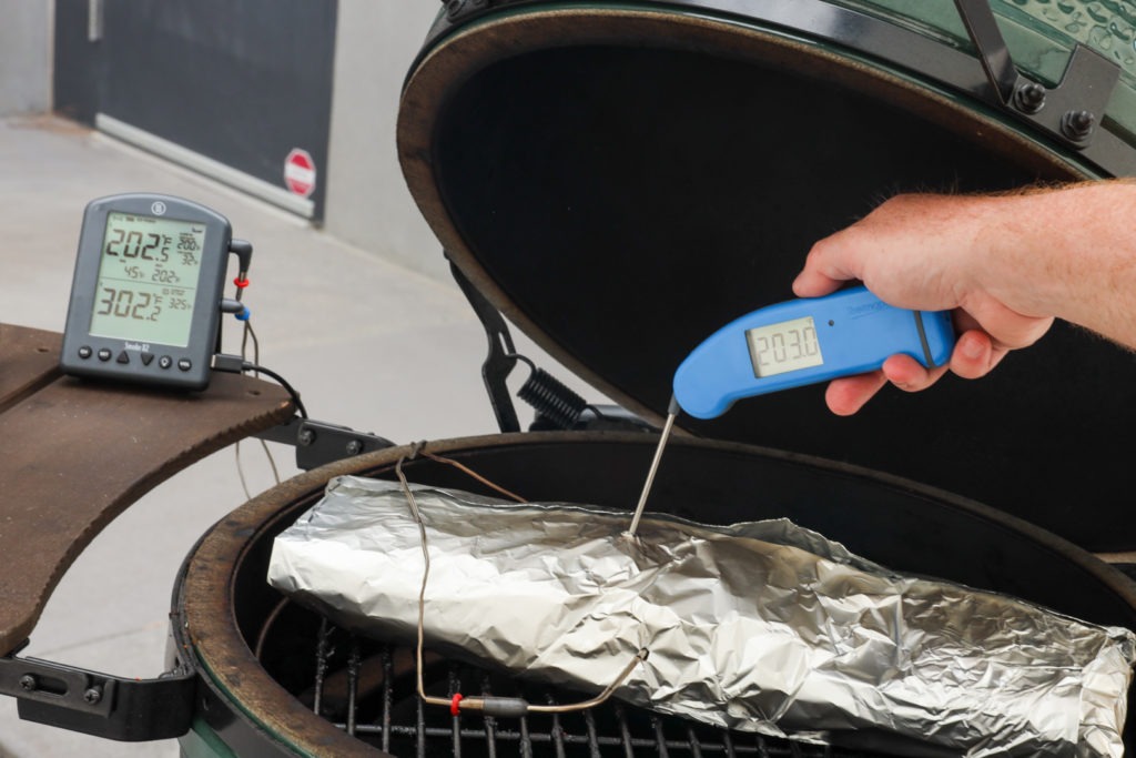 Temping the pork with a Thermapen