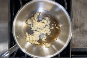Sauteeing onion in a saucepan