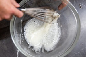 whisking egg until foamy for the marinade