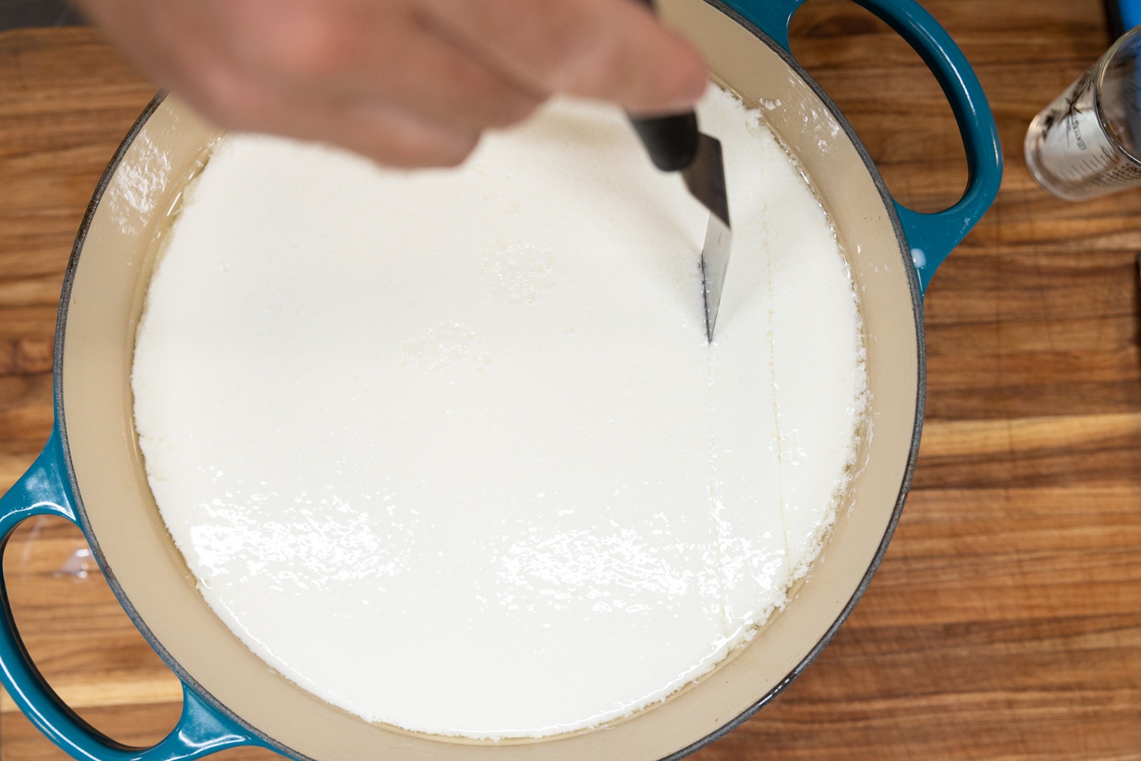Cutting the gel into curds with an offset spatula