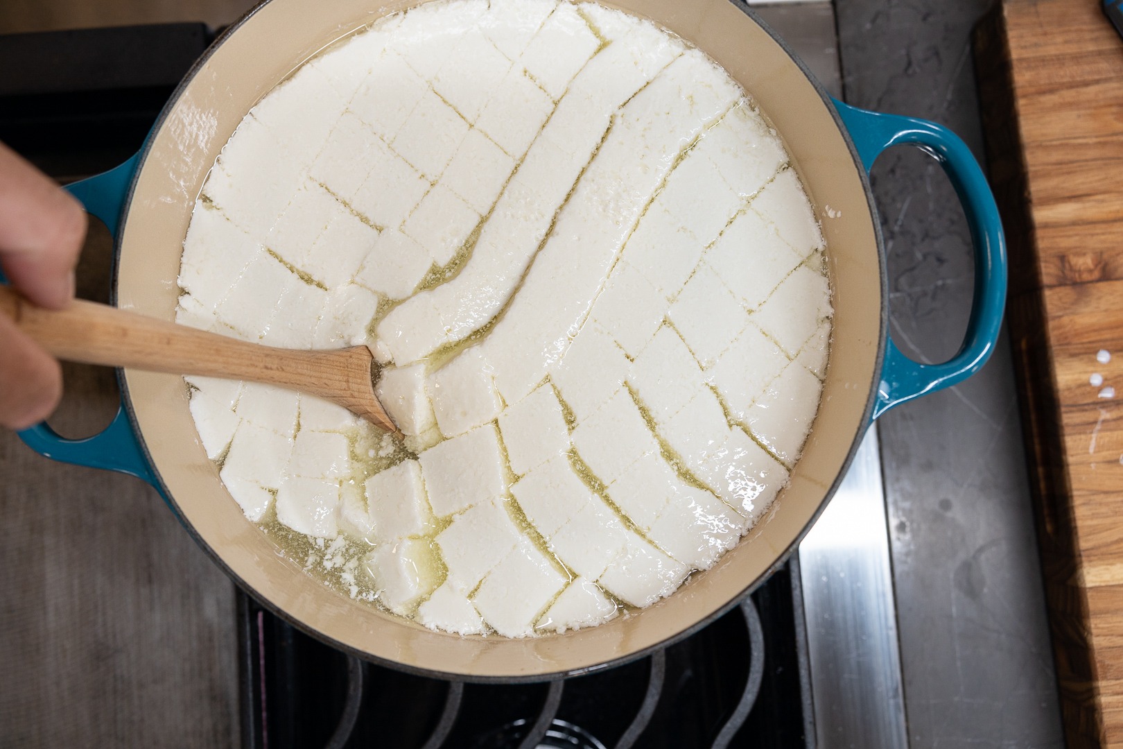 stirring the curds