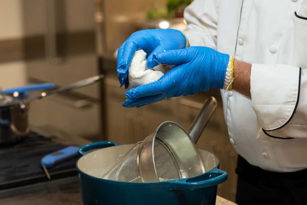 folding the heated curd