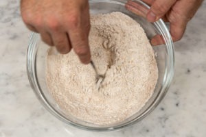 mixing the spices and flour together