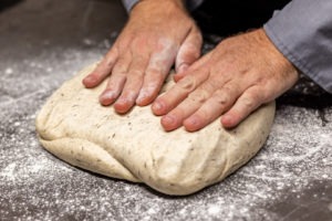 Deflating the dough