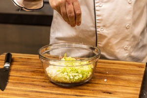 salting chopped cabbage