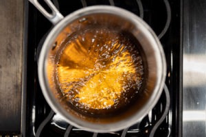 Reducing brandy in a saucepan