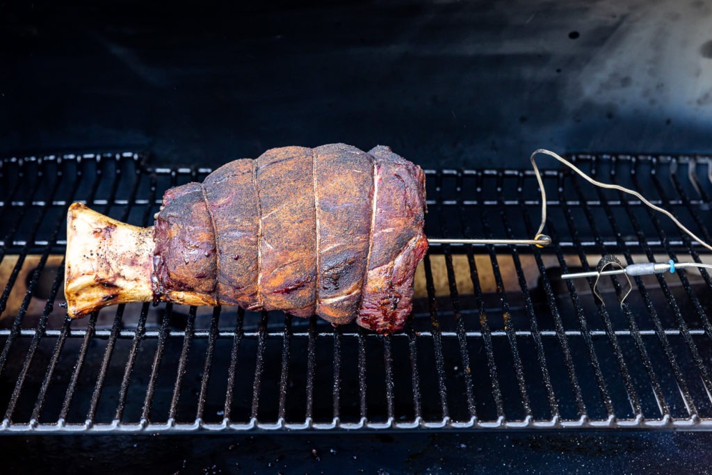 Shank with thermometer probes in smoker