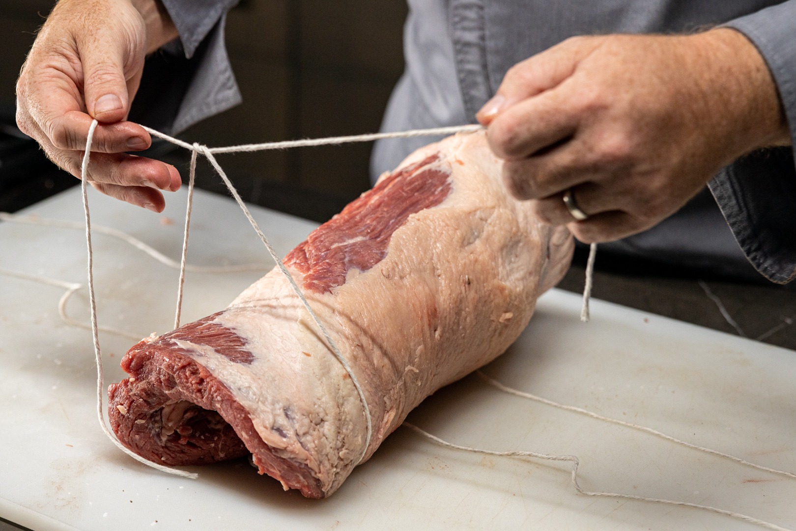 tying the brisket joint