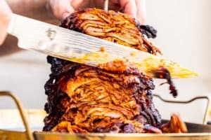 Slicing the pork al pastor