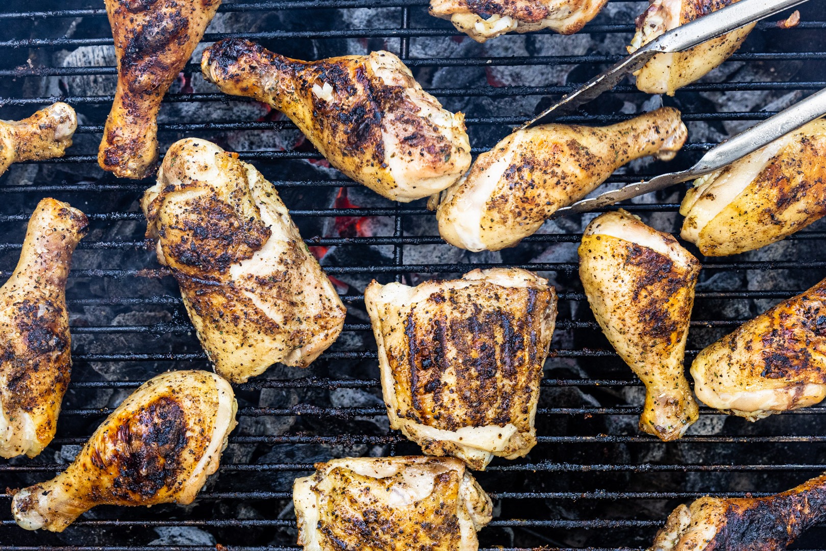 A grill full of chicken