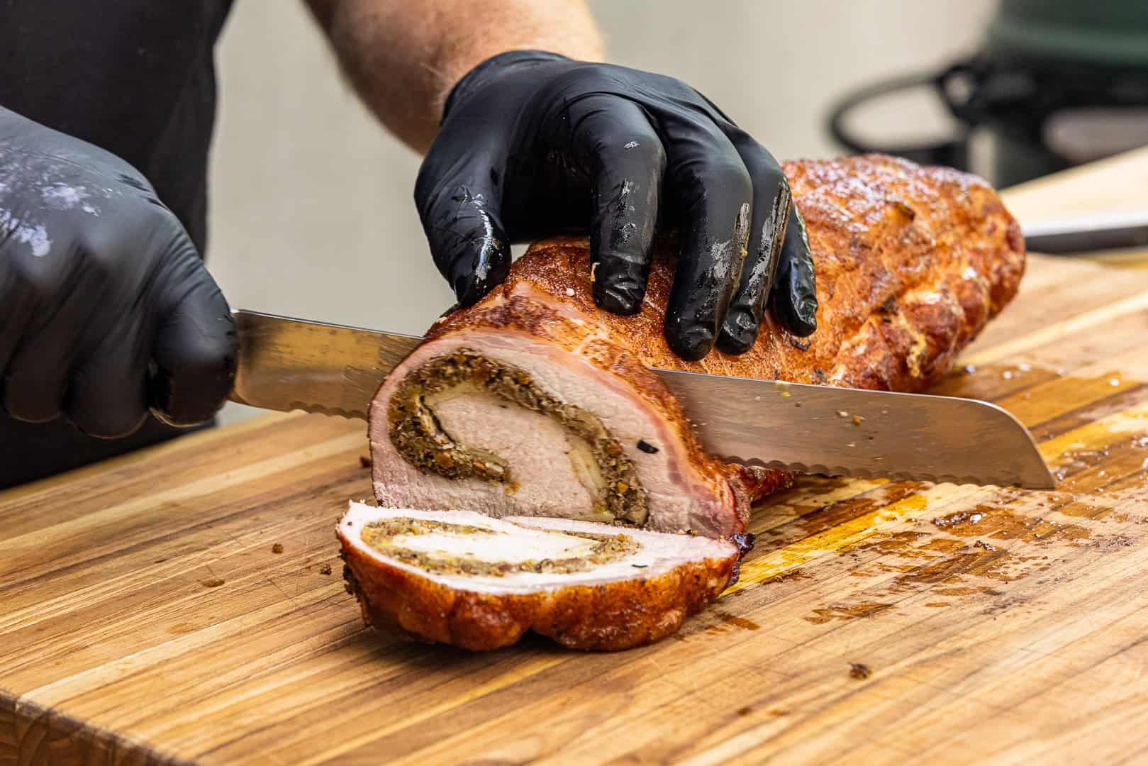 Slicing the stuffed pork loin