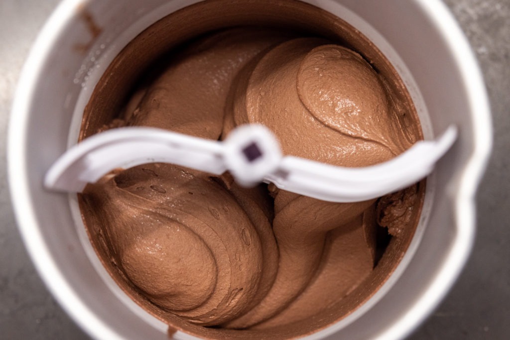 Homemade chocolate ice cream in the churn