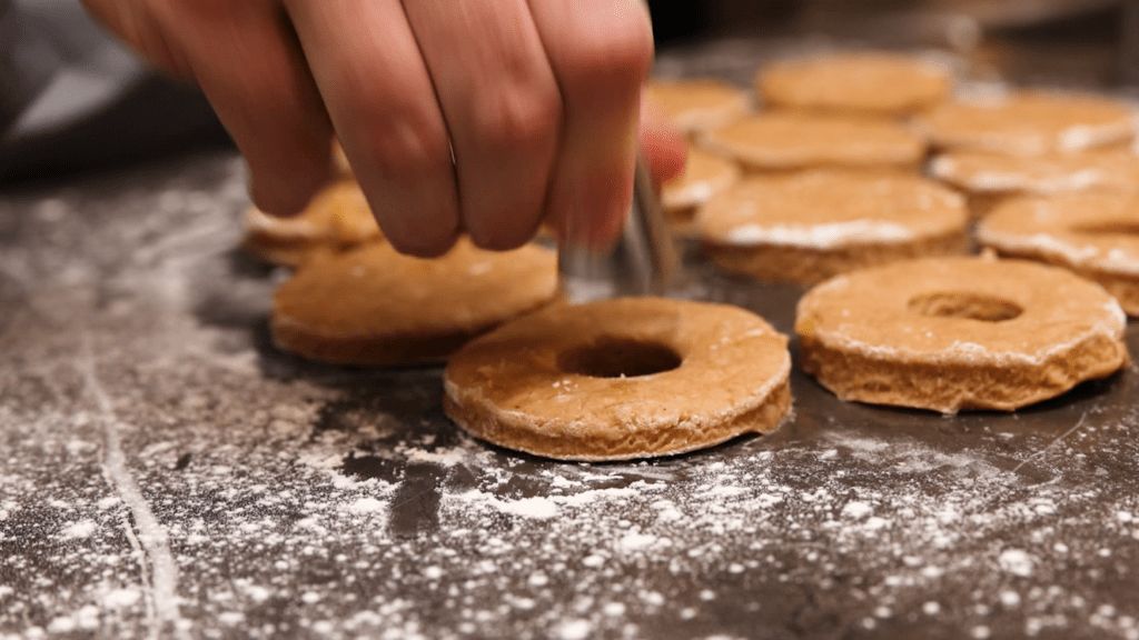 Cutting out cider donuts