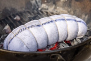 the roast-packet on the hot coals