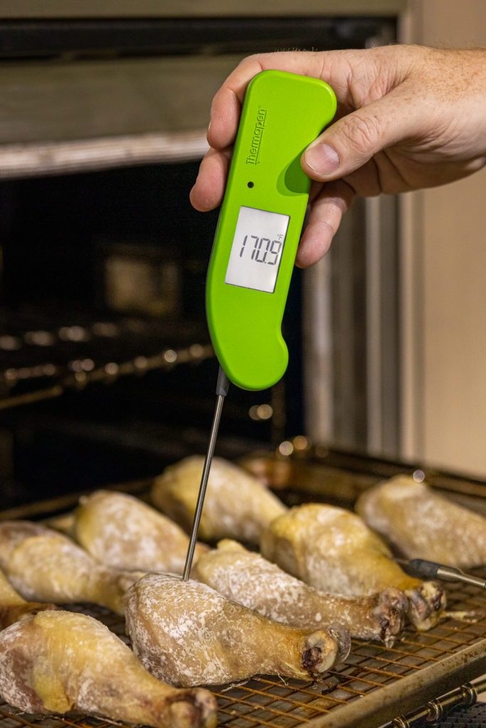 Temping chicken legs in the oven with Thermapen
