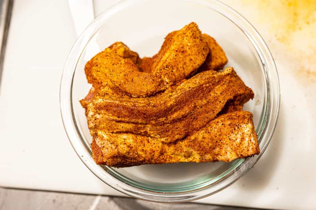 Seasoned pork belly, ready for smoking