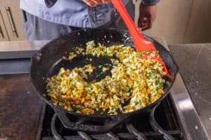 Cooking the raisins and nuts into the mix