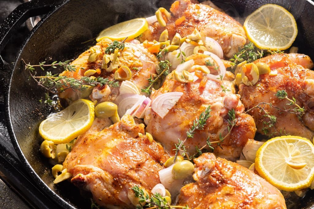 Olives and shallots on the chicken