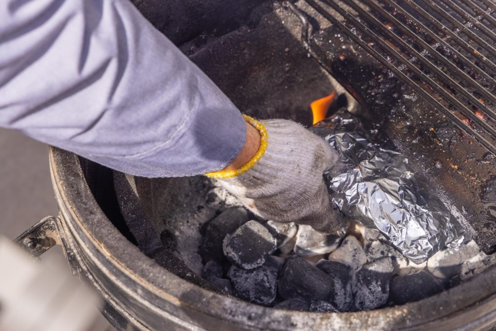 Putting the packet on the coals