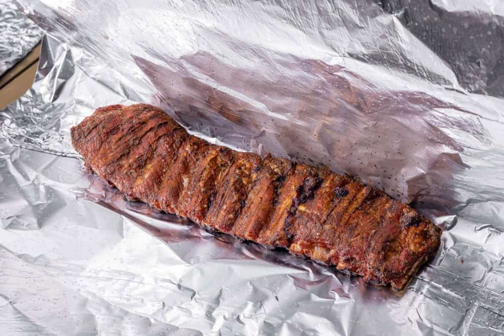 Wrapping the ribs in foil