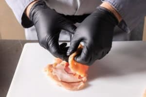 stuffing the chicken