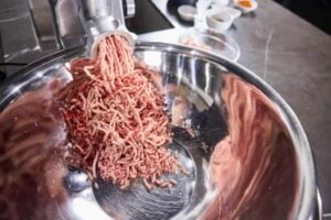 grinding the meat