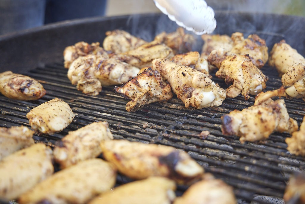 wings searing on a grill