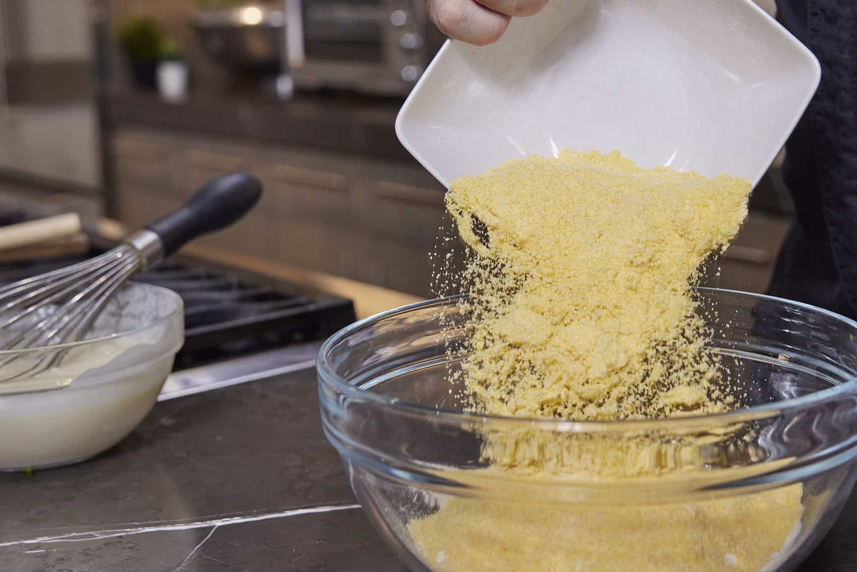 Cornmeal into the bowl