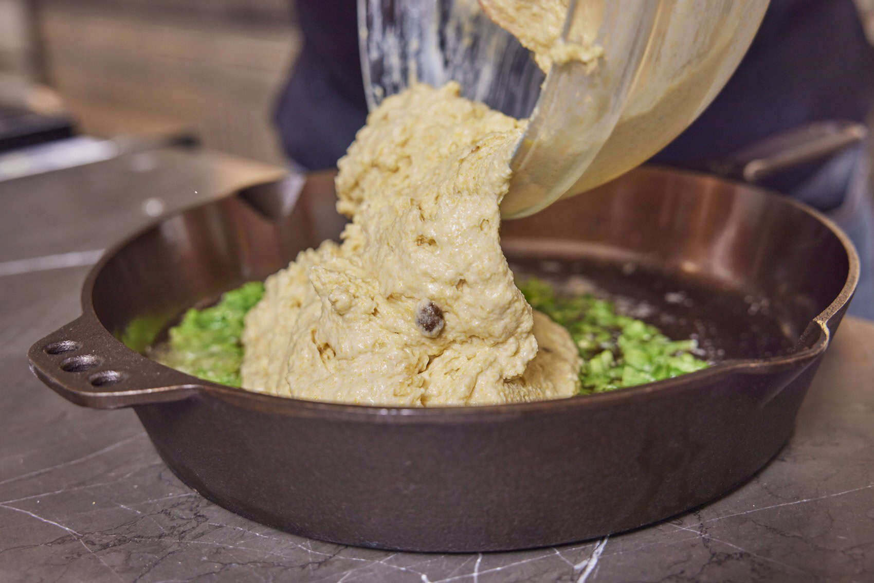 pouring into the skillet